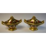 Royal Crown Derby - a pair of 1128 Imari twin handled lobed urns and covers, seconds,