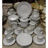 A German Jonelle silver banded white part dinner, tea and coffee service, including teapot, cups,