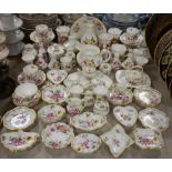 A Royal Crown Derby Posies pattern miniature cabaret set comprising teapot, teacup and saucer,