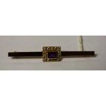 A diamond and amethyst bar brooch,