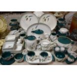 A Denby Greenwheat pattern part dinner and coffee/tea service, serving dishes,