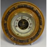A Victorian oak aneroid barometer, c.