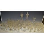 Cut Glass - a pair of late 19th century clear glass decanters; wine glasses;