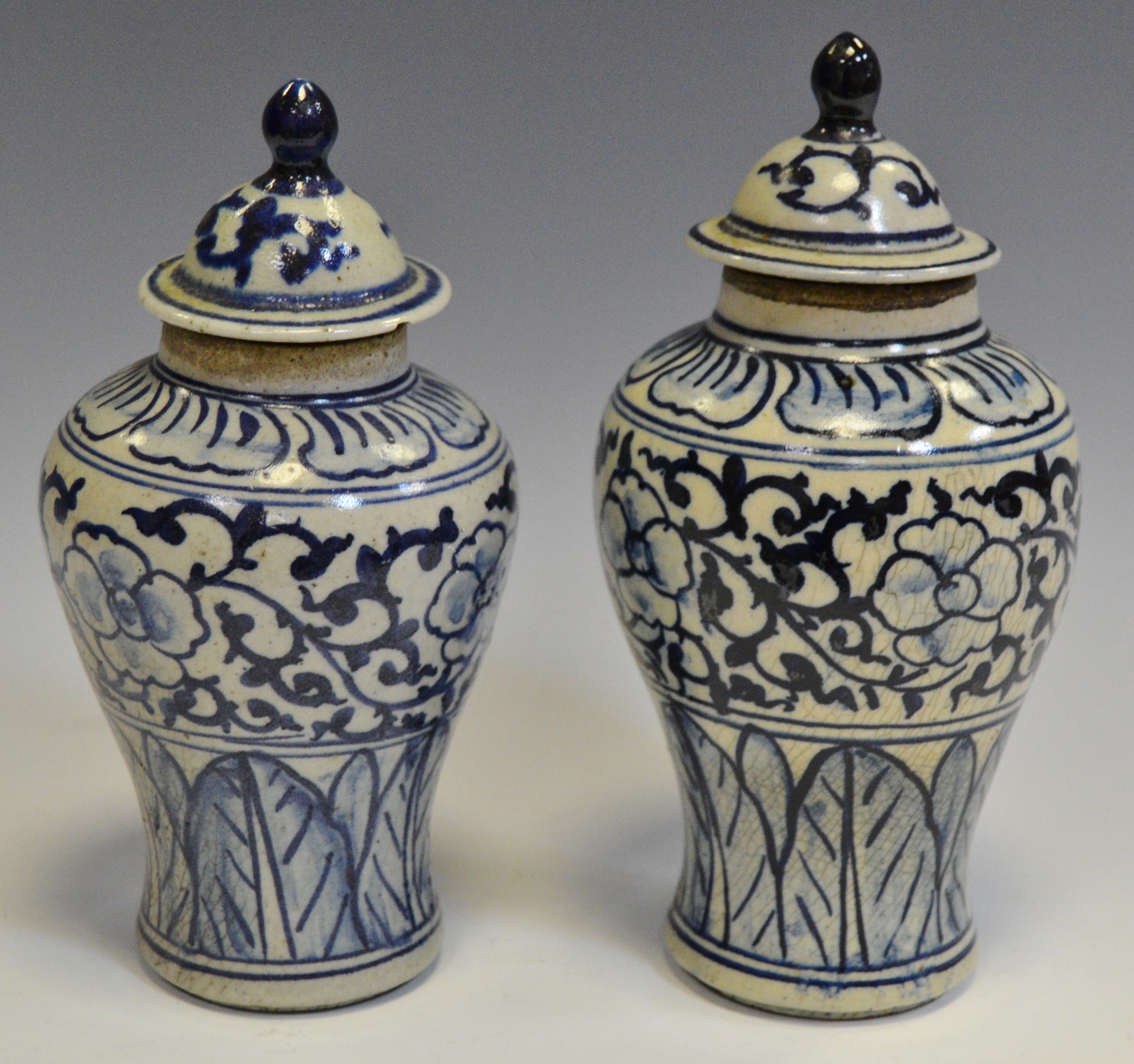 A pair of 18th/19th century Oriental possibly Korean blue and white painted baluster jars and