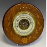 An Edwardian mahogany and marquetry aneroid barometer, inlaid with coloured woods and abalone shell,