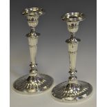A pair of silver candlesticks Chester 1906