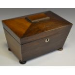 A Victorian rosewood sarcophagus tea caddy, hinged cover enclosing a pair of lidded compartments, c.