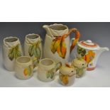 Clarice Cliff - a large Leaf pattern jug; other smaller vases,