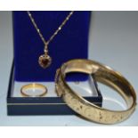 Jewellery - a 22ct gold wedding band, 4g; a 9ct gold garnet pendant necklace etc, 1.