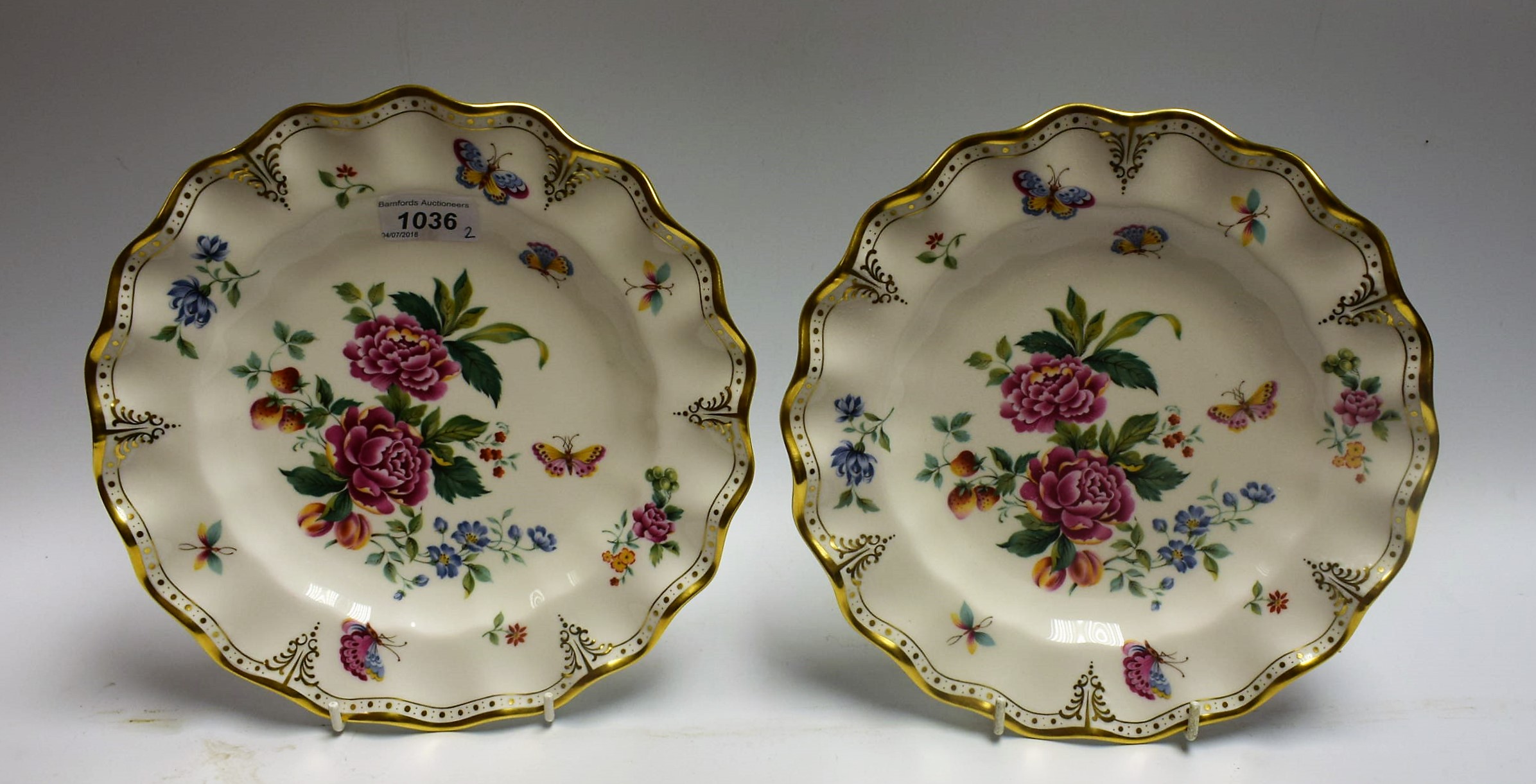 A pair of Royal Crown Derby shaped circular Derby Days cabinet plates, 25cm diameter, printed marks,