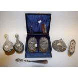 A pair of silver backed brushes and comb, cased; a silver backed hairbrush; others,