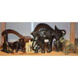 Boxes & Objects - a mid 20th century carved wooden Bison; a wooden clog bottle stand; Elephants,