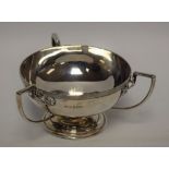 Silver - a three handled silver bowl, shamrock terminals to handles,