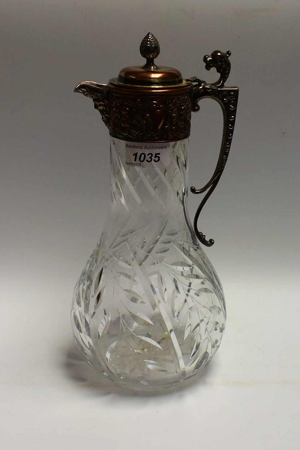 A large Victorian cut glass claret jug,