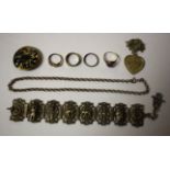 Jewellery - an Indian silver bracelet; pendant; four rings; neckchain;