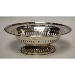 Silver - a silver pierced oval bonbon dish, pierced foot, approx.