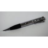 A novelty Ronson lighter pencil, chromed top and lighter fittings, black finger piece,