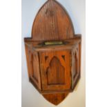 A pitch pine Gothic wall mounted alms/collection box