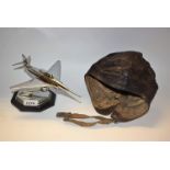 A World War Two period leather flight helmet, ear apertures; a novelty desk lighter,