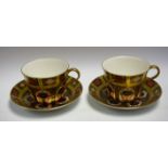 A pair of Royal Crown Derby 1128 pattern breakfast cups and saucers, solid gold band, first quality,