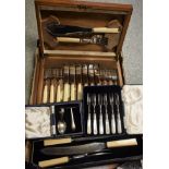 An Elkington cutlery set; a set of six mother of pearl handle forks; a carving set;