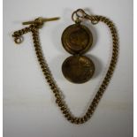 A Victorian brass sovereign case;