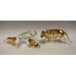 A Swarovski Crystal Lion Mother, 1194085, boxed; an Endangered Wildlife Tiger, Annual Edition 2010,