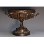A 19th century French brown patinated bronze pedestal mantel urn,
