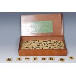 A 19th century instructional spelling alphabet, the mahogany box with sliding cover,