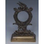 A 19th century Rococo Revival bronze pocket watch stand, cast with an eagle and a lion,