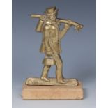A 19th century brass figural pocket watch stand, cast as a gentleman, out wandering,