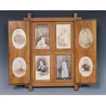 A 19th century olivewood novelty photograph frame, as a shuttered window,