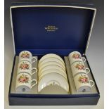 A Royal Worcester coffee service for six, printed with bouquet of flowers,