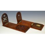 An early Victorian rosewood bookslide, c.1840; another, mounted with brass cut-card work, c.