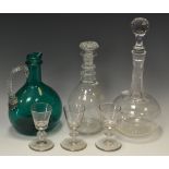 Glassware - a trio of 18th century cordial glasses; a wheel cut decanter;