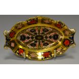 A Royal Crown Derby 1128 pattern shaped oval trinket dish, solid band, printed mark,