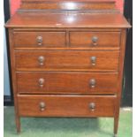 An oak chest of drawers,