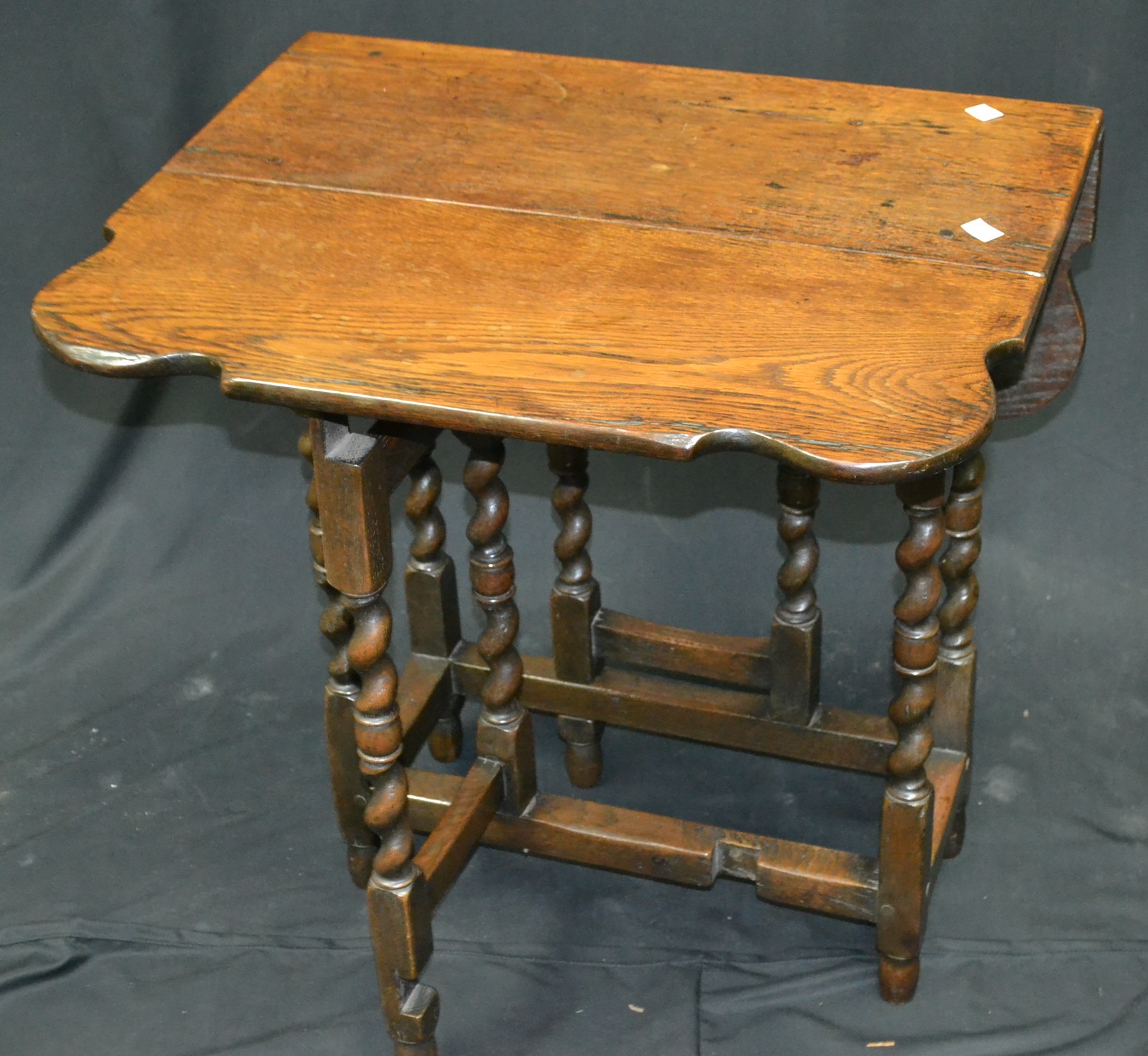 An unusual 18th century style oak gateleg table, shaped leaves, c.