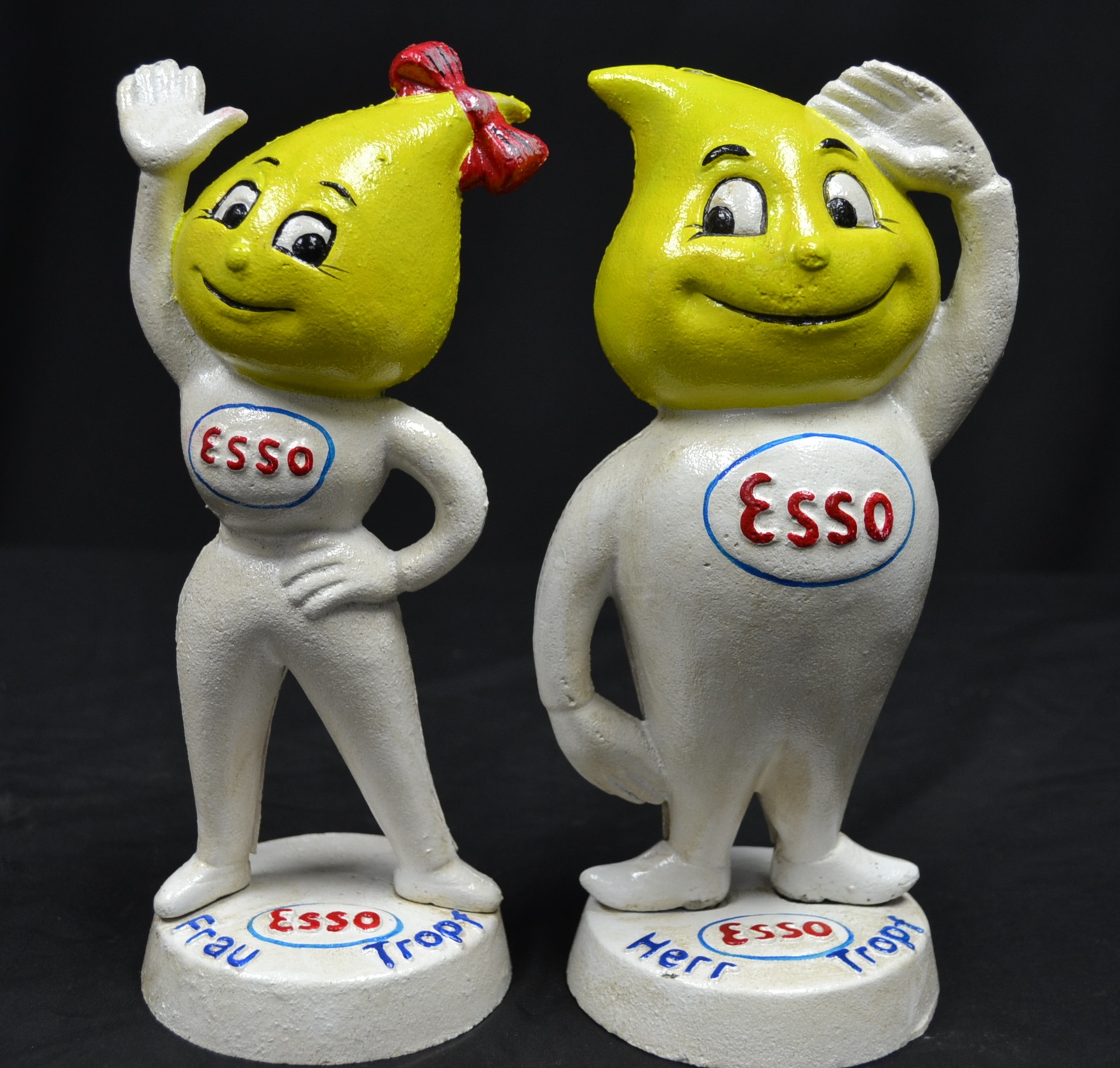 A pair of reproduction cast metal Esso money banks Herr and Frau Tropf