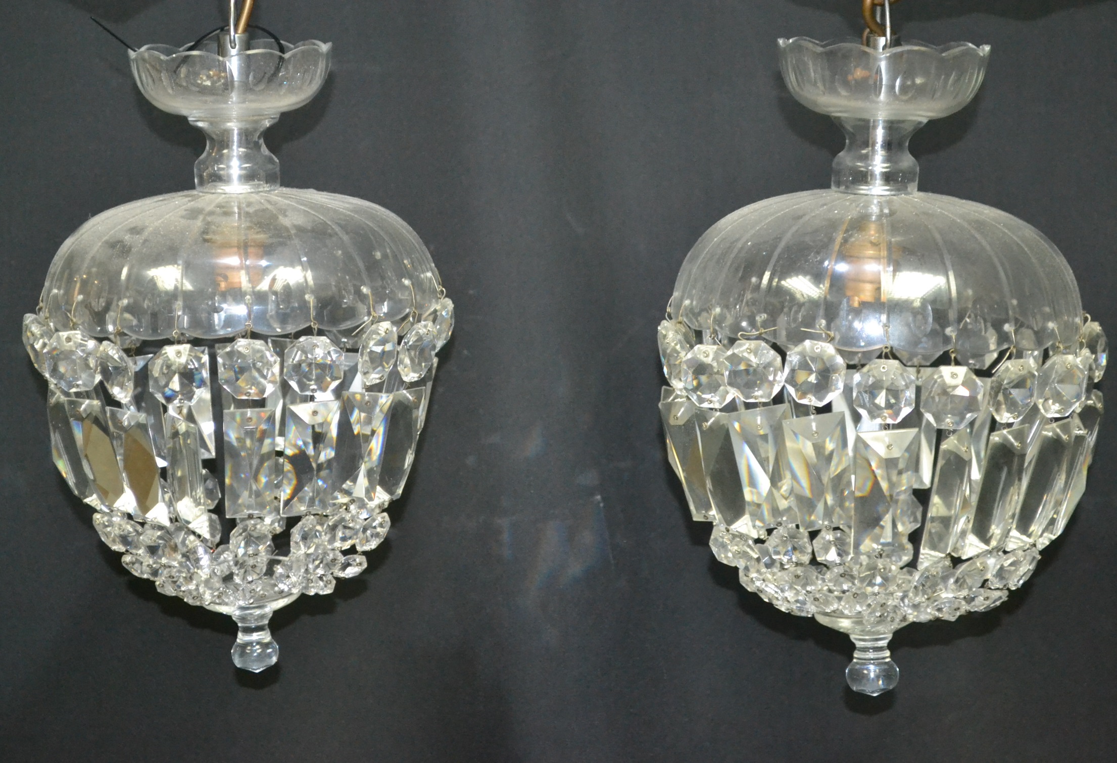 A pair of cut glass cup and drop chandeliers