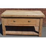 A large butcher's block, large top, pine base, deep drawer to frieze, plank undertier.