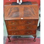 An early 20th century mahogany bureau