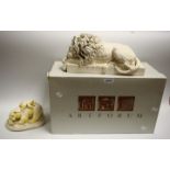 An Artforum model of Canova's Lion, boxed; a figure of a polar bear and cub,