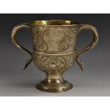 A George III silver bell shaped loving cup, scroll-capped handles, three-quarter girdle,