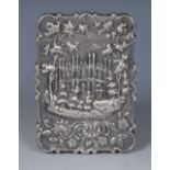 A 19th century silver coloured metal shaped rectangular castle top visiting card case,