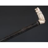 A 19th century Colonial marine ivory and ebony walking cane,