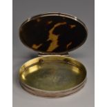 A George I silver and tortoiseshell oval snuff box, stand-away hinged cover, gilt interior,