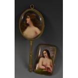 A late 19th century German porcelain mounted gilt metal hand mirror,