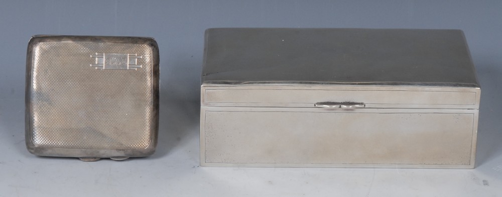 A Chinese silver rectangular cigarette box, hinged cover, sandalwood interior, 16.