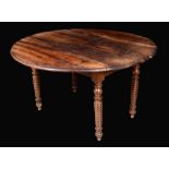 A 19th century fruitwood drop leaf dining table, oval moulded top, ring turned legs, 70cm high,